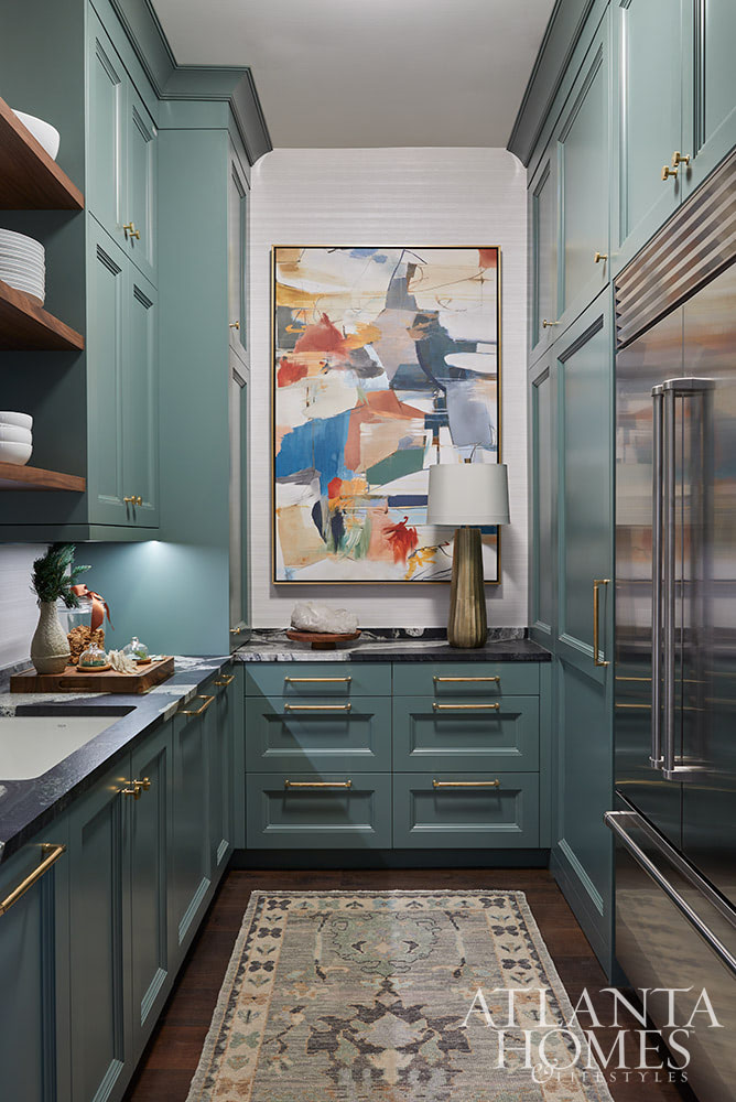 Atlanta Homes & Lifestyles | Mary Kathryn Timoney, Design Galleria Kitchen and Bath Studio | Photography by Kelly Blackmon for Emily Followill PhotographyWe have a confession: we’ve fallen head over heels for something we didn’t even know we needed in our life—a scullery.  This little gem is making a comeback, and we are here for it. This tucked-away space where the real magic (and mess) happens is the spot for the dirty dishes, the  extra fridge you swear you’ll organize next week. It’s practical, sure, but the perfect space to add personality. When the kitchen’s all polished for company, the scullery’s where you can hide the chaos—because even the most organized hostess doesn't have it all together when guests arrive early. Trust us, it’s the unsung hero of your home!