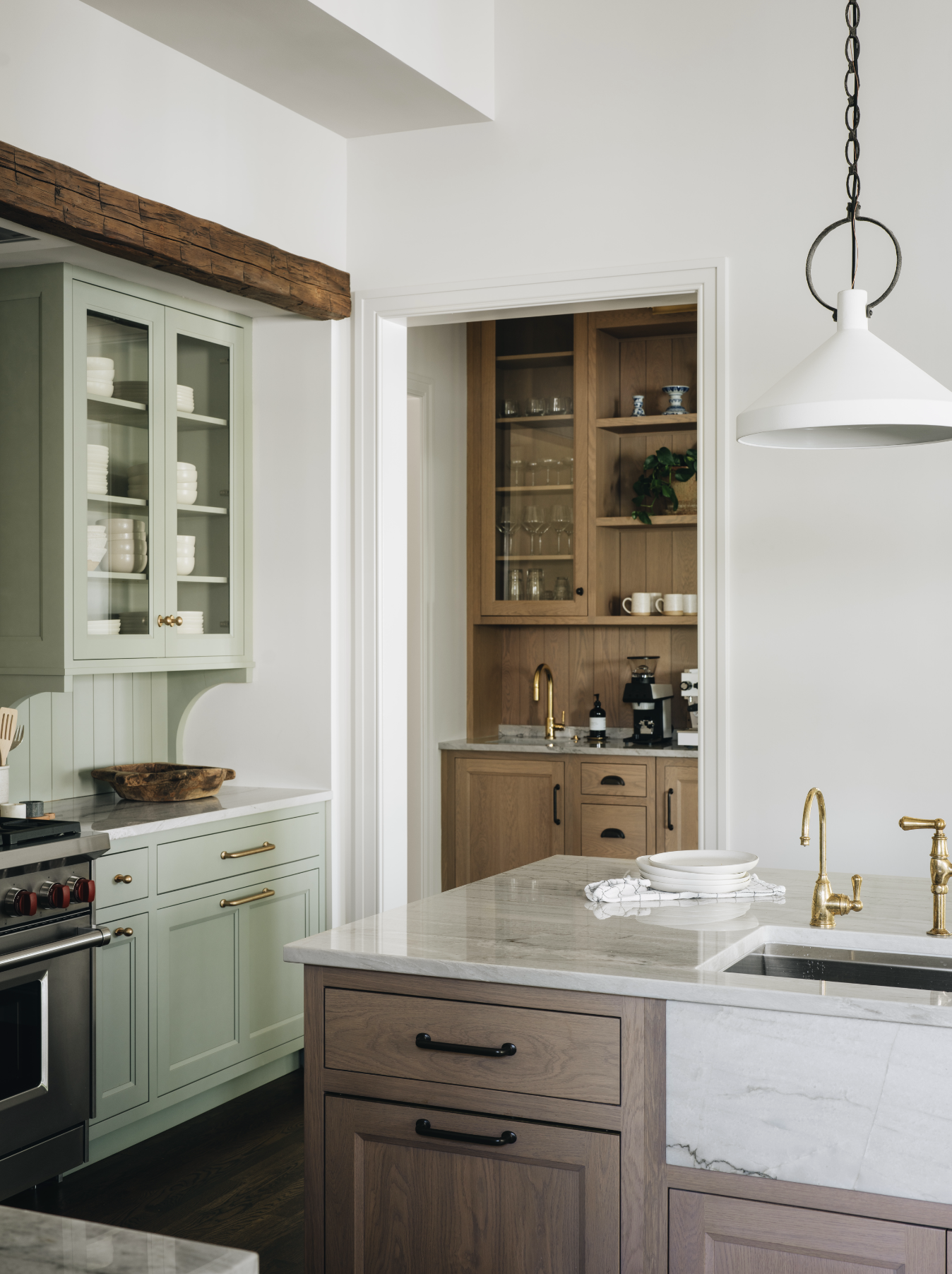 Jean Stoffer Design | Stoffer Photography InteriorsWe have a confession: we’ve fallen head over heels for something we didn’t even know we needed in our life—a scullery.  This little gem is making a comeback, and we are here for it. This tucked-away space where the real magic (and mess) happens is the spot for the dirty dishes, the  extra fridge you swear you’ll organize next week. It’s practical, sure, but the perfect space to add personality. When the kitchen’s all polished for company, the scullery’s where you can hide the chaos—because even the most organized hostess doesn't have it all together when guests arrive early. Trust us, it’s the unsung hero of your home!