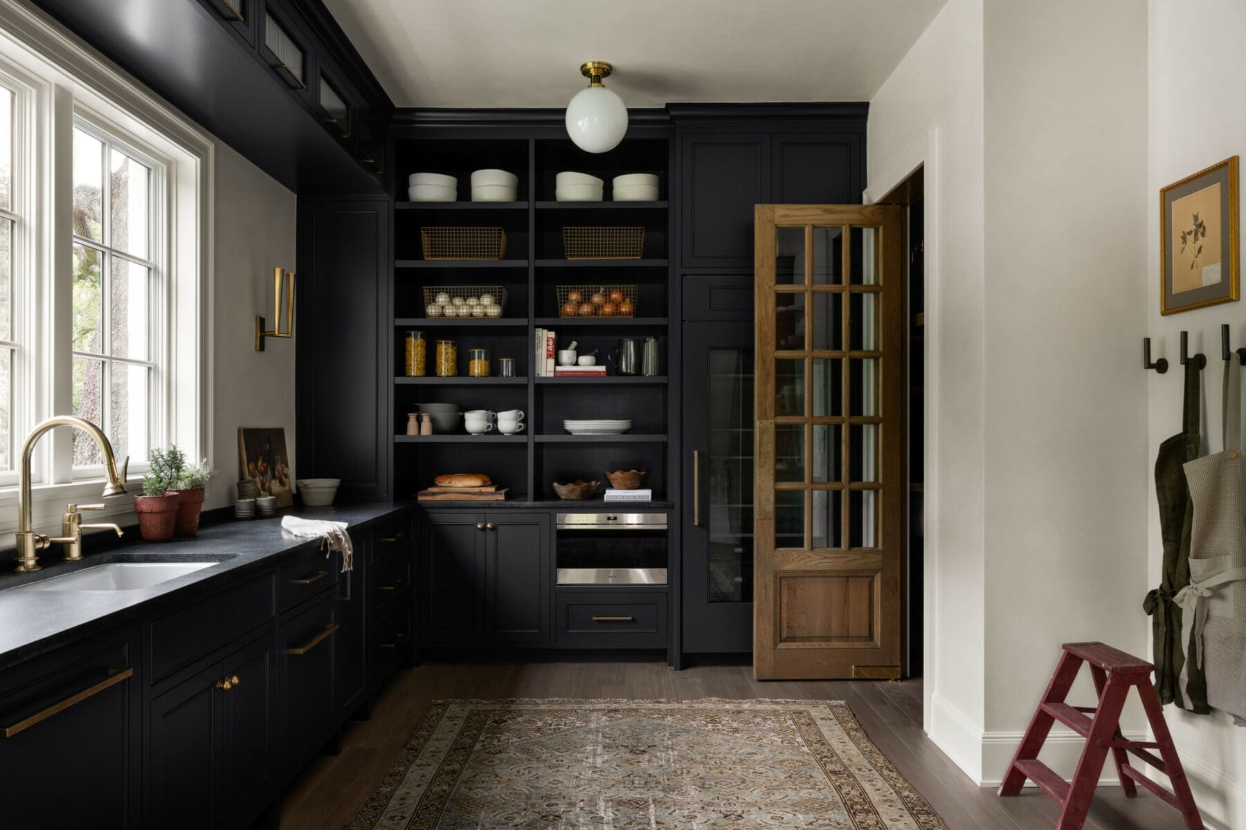 Studio McGee | Lucy Call PhotographyWe have a confession: we’ve fallen head over heels for something we didn’t even know we needed in our life—a scullery.  This little gem is making a comeback, and we are here for it. This tucked-away space where the real magic (and mess) happens is the spot for the dirty dishes, the  extra fridge you swear you’ll organize next week. It’s practical, sure, but the perfect space to add personality. When the kitchen’s all polished for company, the scullery’s where you can hide the chaos—because even the most organized hostess doesn't have it all together when guests arrive early. Trust us, it’s the unsung hero of your home!