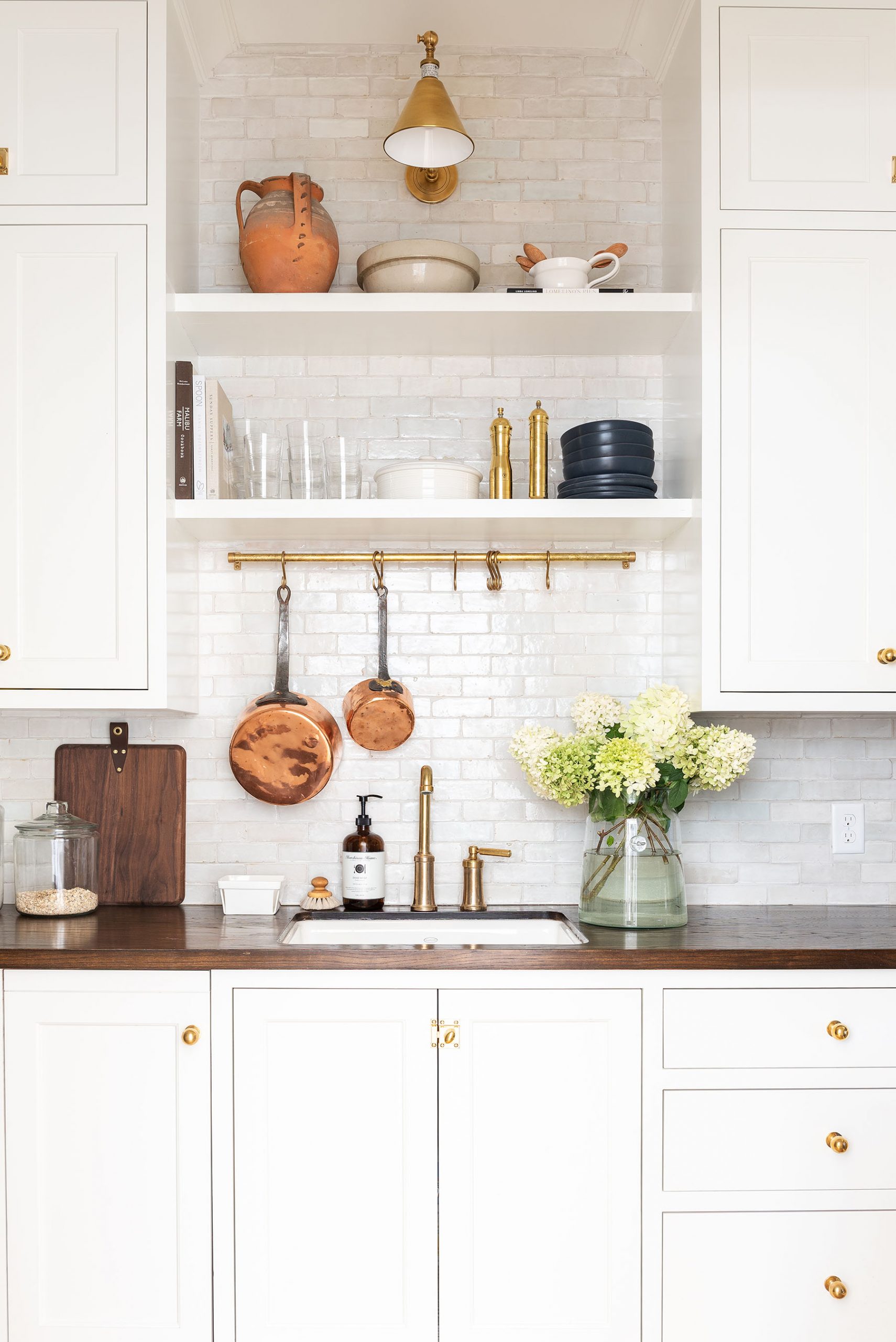 Studio McGee | Lucy Call PhotographyWe have a confession: we’ve fallen head over heels for something we didn’t even know we needed in our life—a scullery.  This little gem is making a comeback, and we are here for it. This tucked-away space where the real magic (and mess) happens is the spot for the dirty dishes, the  extra fridge you swear you’ll organize next week. It’s practical, sure, but the perfect space to add personality. When the kitchen’s all polished for company, the scullery’s where you can hide the chaos—because even the most organized hostess doesn't have it all together when guests arrive early. Trust us, it’s the unsung hero of your home!
