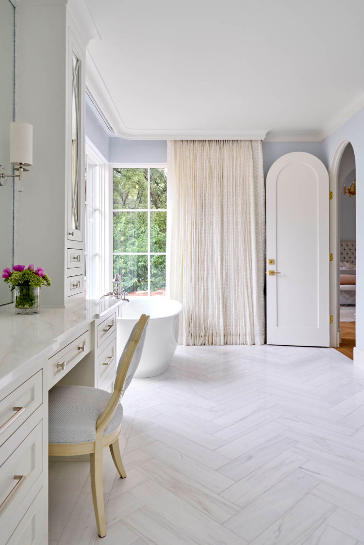 As the world spins faster and we get busier, it becomes increasingly important for our homes to be the soothing retreats we need to unwind. There’s no place where that is more important than in the first place you see in the morning and the last place you visit at night: your bathroom. Take a peek at some of our favorite tips for creating a spa-like bathroom retreat. Jenkins Interiors | Nathan Schroder Photography