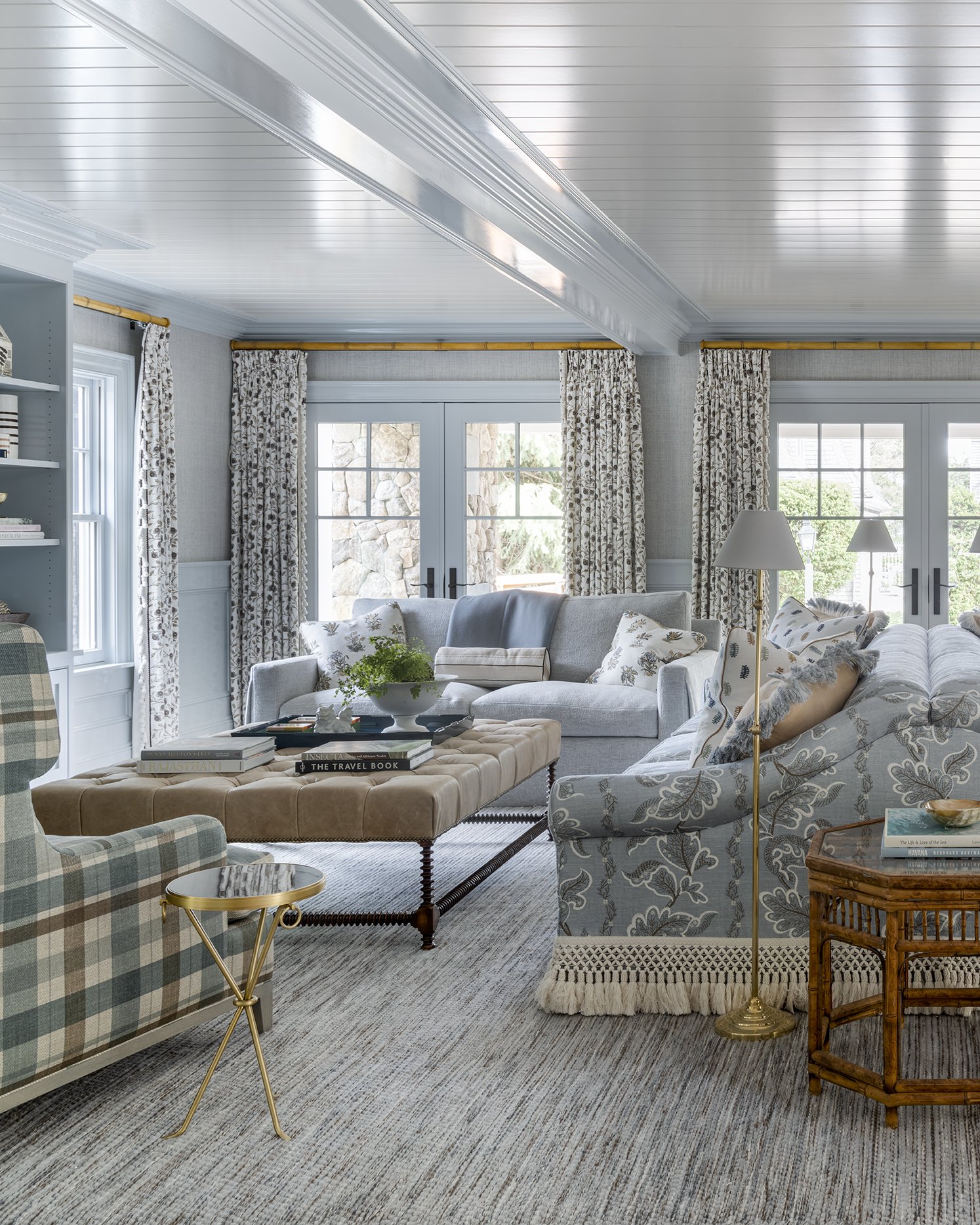 Beautiful living room in blue and white in this Cape Cod home - Honey Collins Interiors and Patrick Ahearn Architect - Sarah Winchester Photography