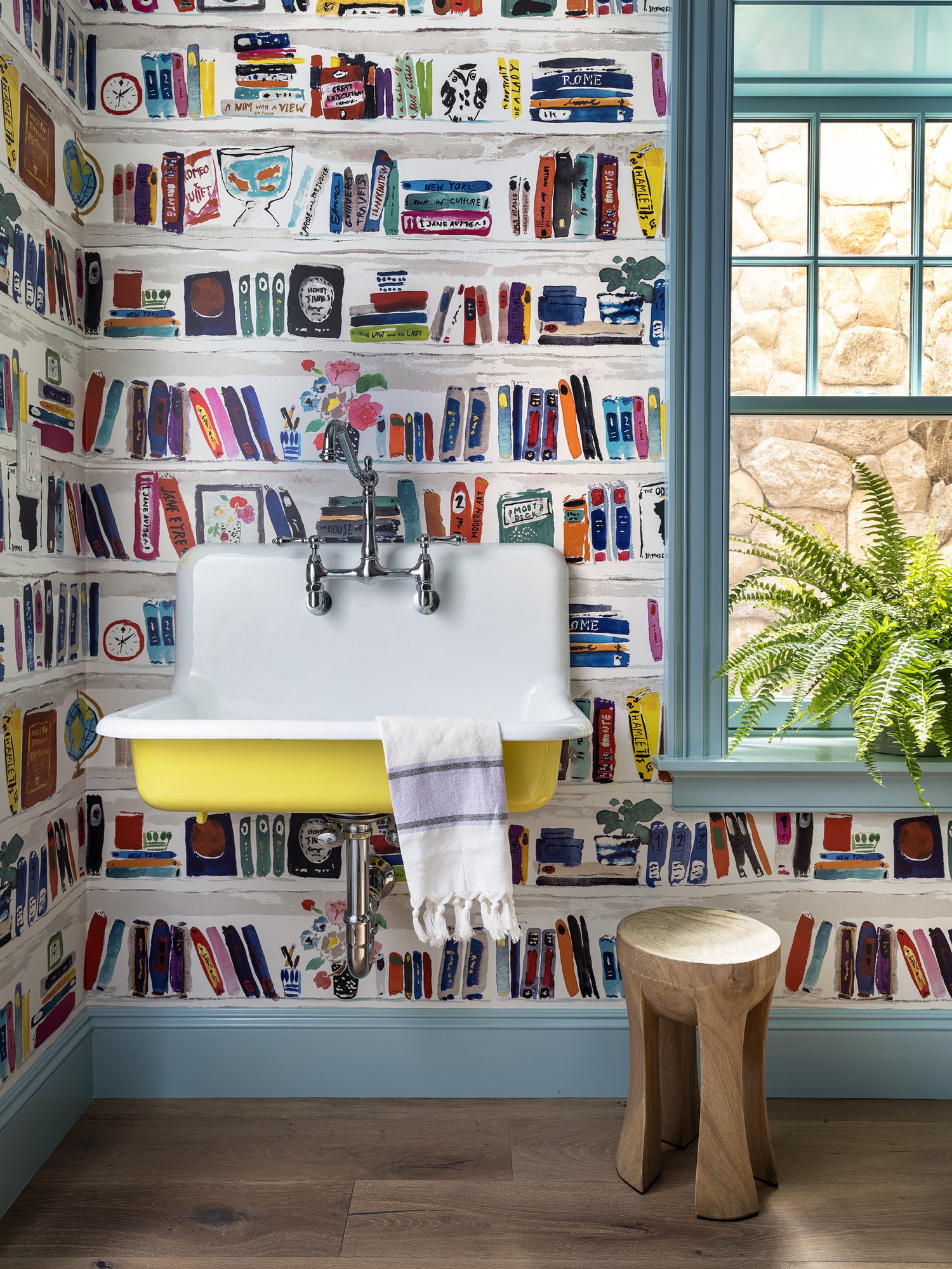 Honey Collins Interiors and Patrick Ahearn Architect - Sarah Winchester Photography - fun playroom with great wallpaper and a yellow kohler brockway sink in this stunning Cape Cod home