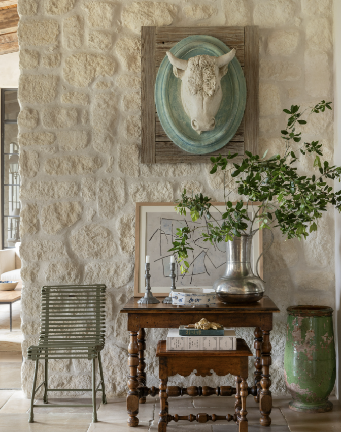 Beautiful stonework in this foyer designed by architect T.S. Adams -Tradition Made New soulful houses