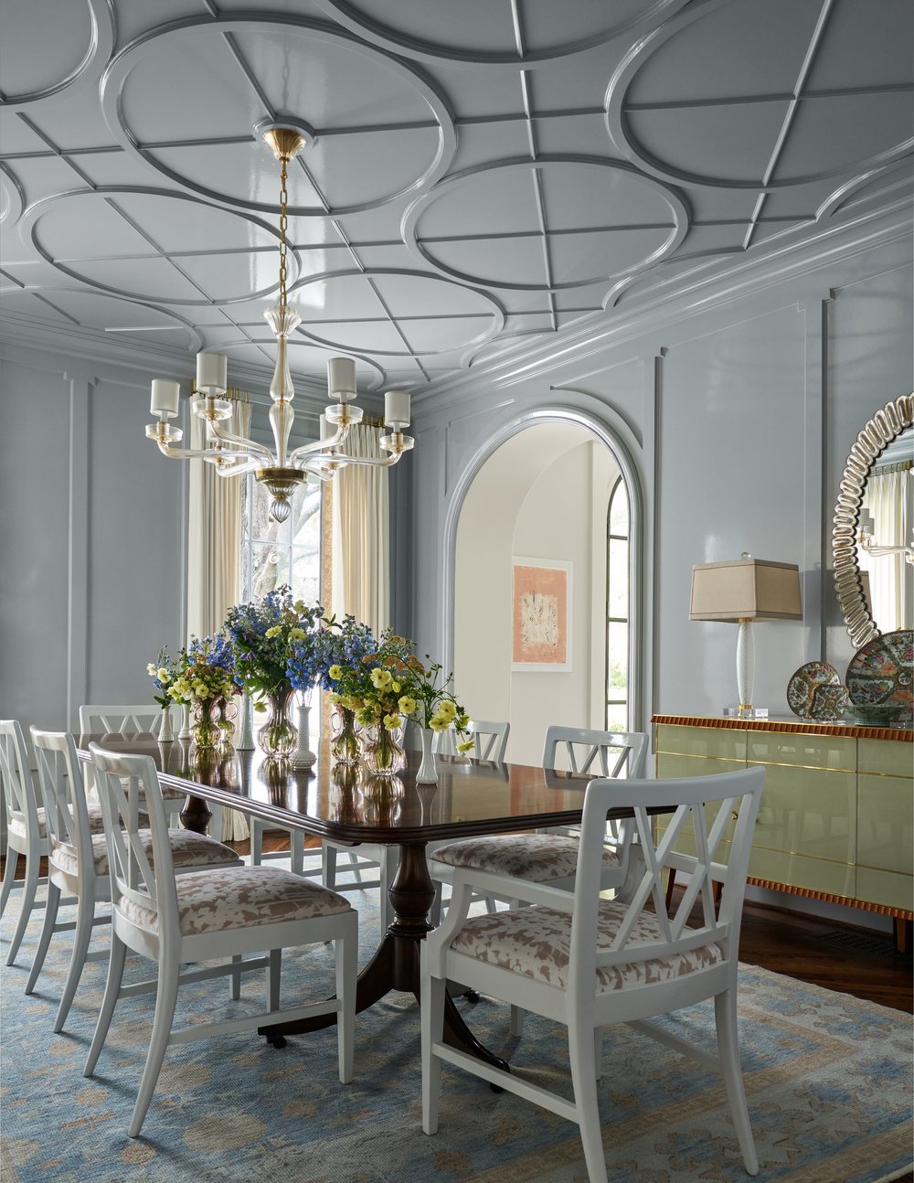If there’s one design trend that’s sweeping through homes, it’s color drenching—and it’s a look that feels both daring and utterly timeless.Imagine walking into a room where the walls, trim, ceiling, and even the furniture are bathed in a single, sumptuous hue. It’s not just a splash of color, it’s an immersive experience, and the perfect way to wrap a room in warmth, charm, and fearless flair -Mary Beth Wagner Interiors | Nathan Schroder Photography