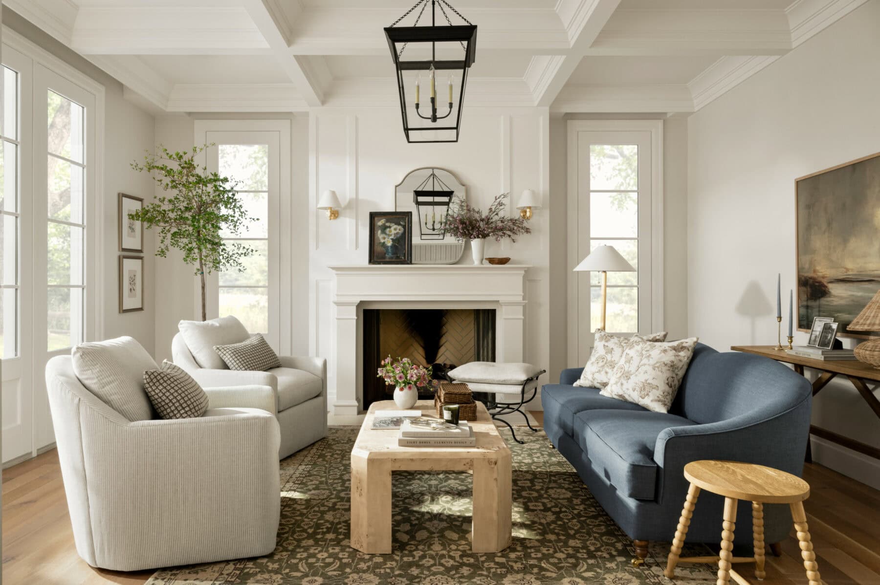  We absolutely adore the beautiful designs of Studio McGee–and husband/wife team Syd and Shea McGee.  With a signature style that seamlessly blends classic and contemporary elements, their work has become synonymous with elegant and approachable design. Adore the living room with the lantern hanging in the center of the room