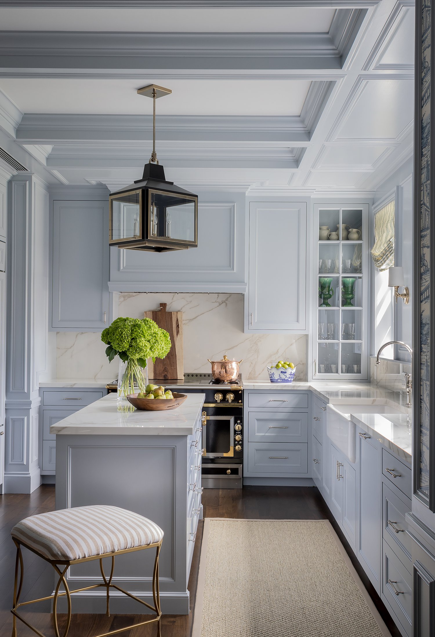 Beautiful blue kitchen with a hanging lantern. Designed by the talented Honey Collins, Pauli & Uribe Architects,Builder: F.H. Perry,Photography: Michael J. Lee