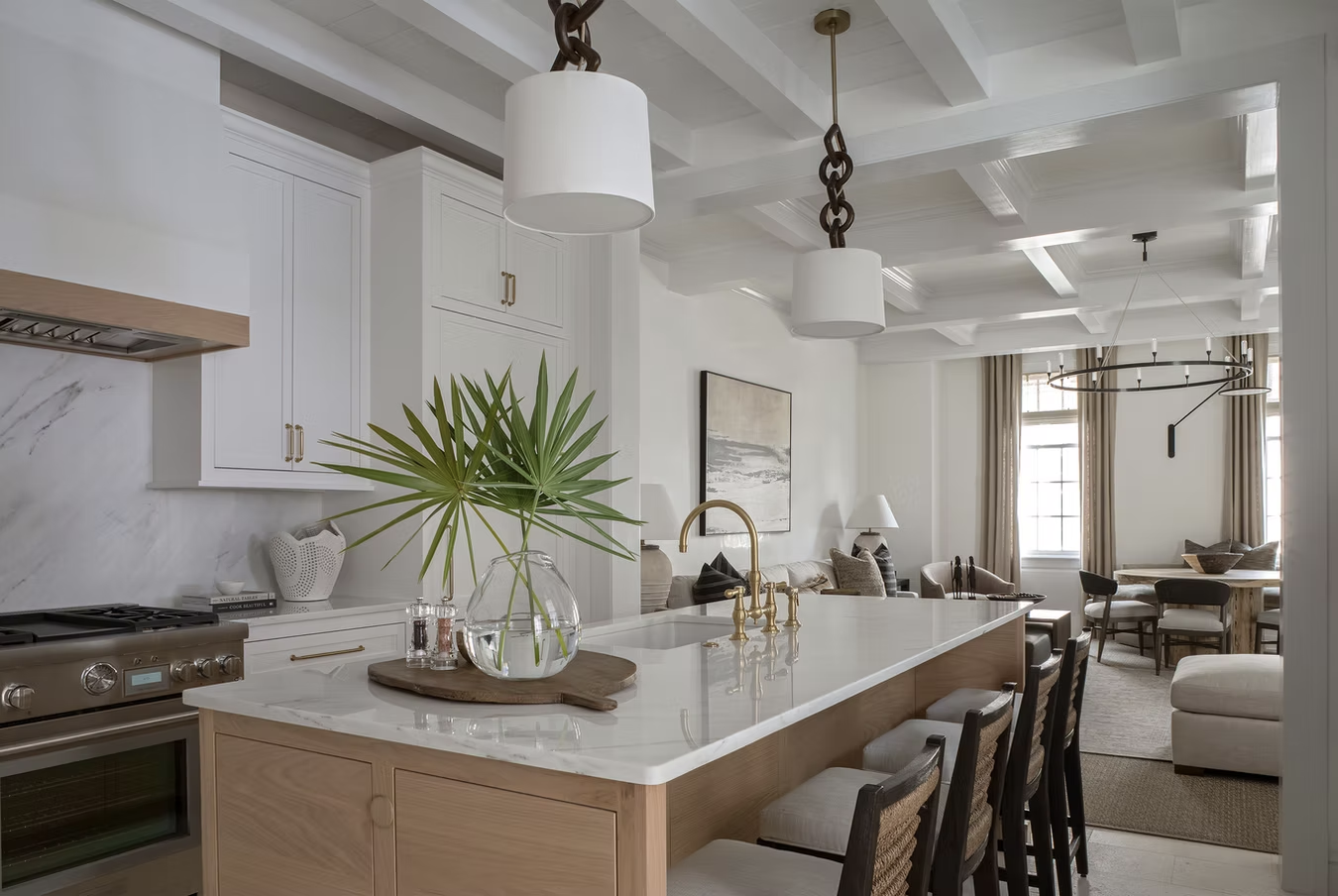 If you're in the mood for a vacation today, but can't leave Alys Beach home designed by Brad Ramsey Interiors  and, you'll feel like you're a million miles away! Jack Gardner Photography - Beautiful white kitchen with wood accents