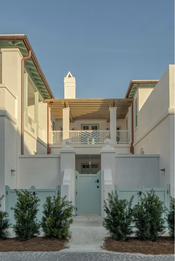  If you're in the mood for a vacation today, but can't leave town, don't worry! One peek at this stunning coastal home on Alys Beach designed by Brad Ramsey Interiors  and, you'll feel like you're a million miles away! Jack Gardner PHotography - white house with light shutters