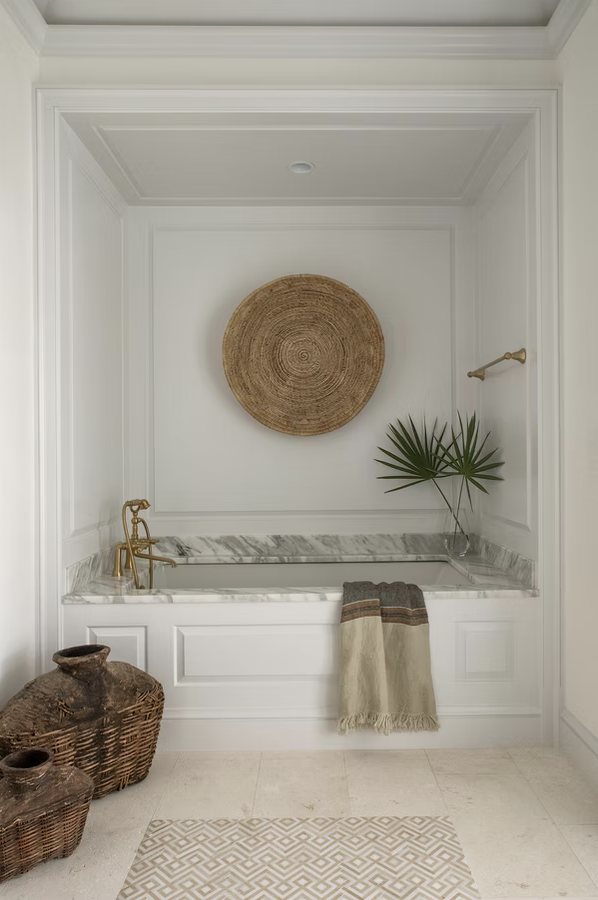  If you're in the mood for a vacation today, but can't leave town, don't worry! One peek at this stunning coastal home on Alys Beach designed by Brad Ramsey Interiors  and, you'll feel like you're a million miles away! Jack Gardner PHotography Such a beautiful relaxing bathroom with this built in bathtub