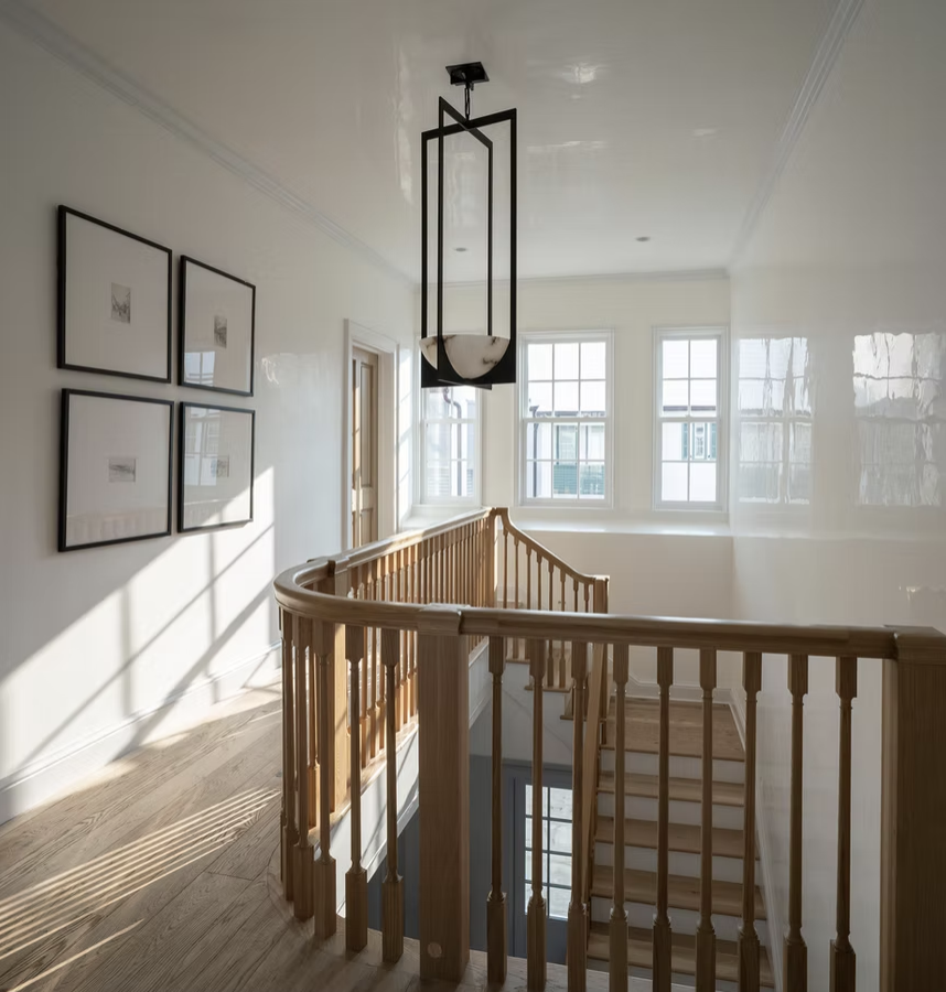 If you're in the mood for a vacation today, but can't leave Alys Beach home designed by Brad Ramsey Interiors  and, you'll feel like you're a million miles away! Jack Gardner Photography - Beautiful curved staircase