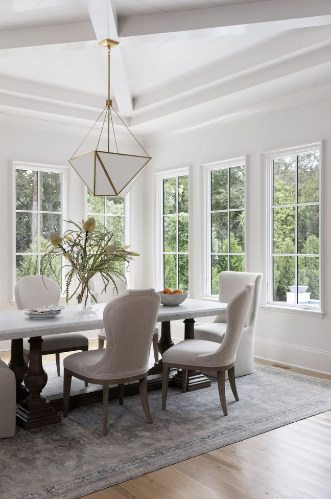 Now, we're back with another stylish home from this talented team that is one for the books, one that speaks to the very heart of the chic gorgeousness and soothing yet utterly chic simplicity that we're always hoping to achieve. The chandelier from Visual Comfort is a favorite! Photographed by Heather Ison  Styled by Ashley Hotham Cox