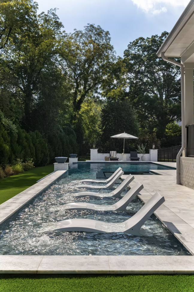 Now, we're back with another home tour from this talented team that is one for the books, one that speaks to the very heart of the chic gorgeousness and soothing yet utterly chic simplicity that we're always hoping to achieve. Who doesn't love a pool and one as chic as this is everything! Photographed by Heather Ison  Styled by Ashley Hotham Cox