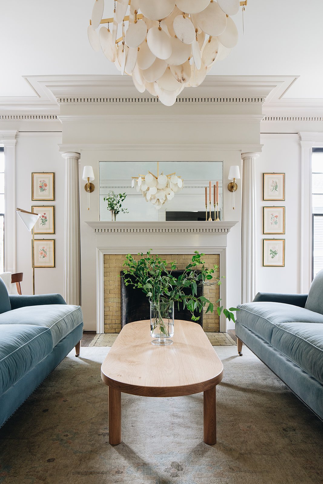 LIving room with a pair of blue velvet sofas - Jean Stoffer Design | Stoffer Photography Interiors