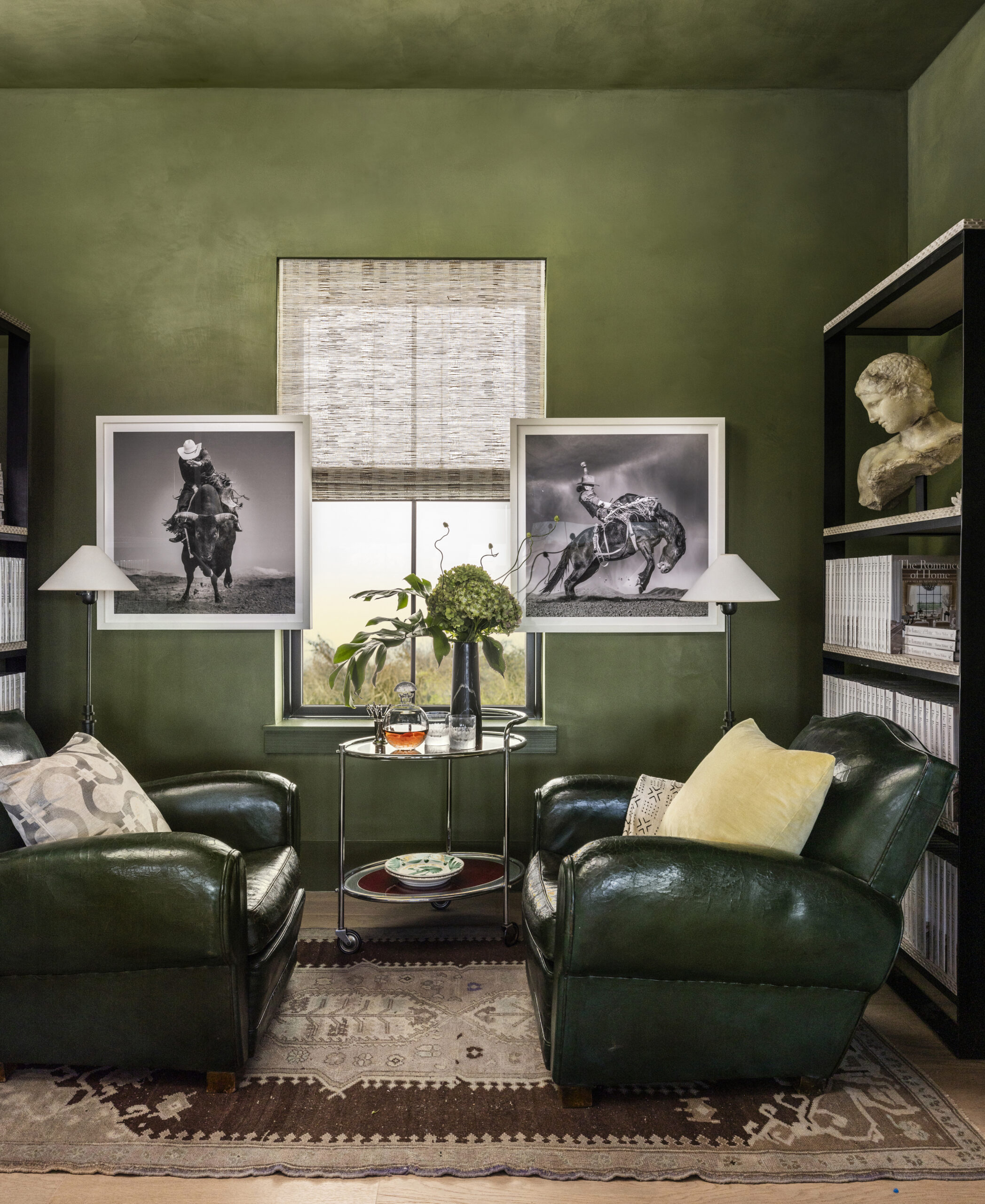 We are so excited to share the stunning Round Top Designer Showhouse rooms  by the talented Mohon Interiors. This living room with it's beautiful leather chairs and green walls is stunning. -photography by Julie Soefer 