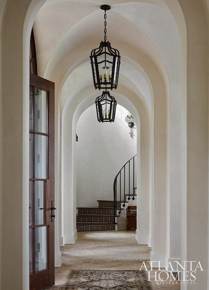 Who couldn’t help but fall in love at first sight with this stunning Sea Island home? In calming colors and soothing tones, this home is nothing short of a sanctuary–with views for day. Atlanta Homes & Lifestyles Interior Designer: Courtney Giles Interiors,  Architect: Josh G. Youngner Architect, Builder: The Van Waters Company, Original Architect: Thomas Thaddeus Truett Architect, 